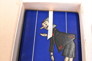 Stefania Zeppieri | Conservation and Restoration of Library Assets, Works of Art on Paper and Related Artifacts | Restoration of Rare Early Pinocchio Edition: Book and Game